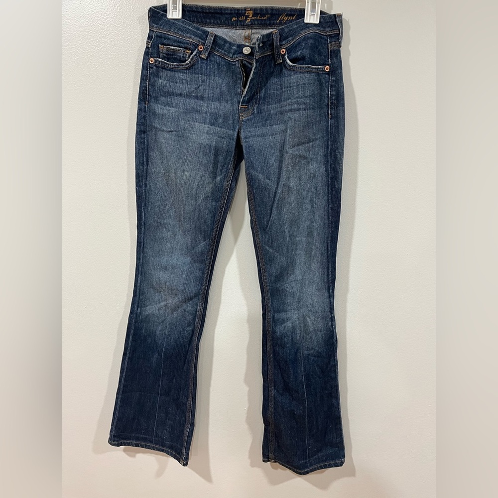 7 for all mankind, medium wash, boot cut jeans. Size 27